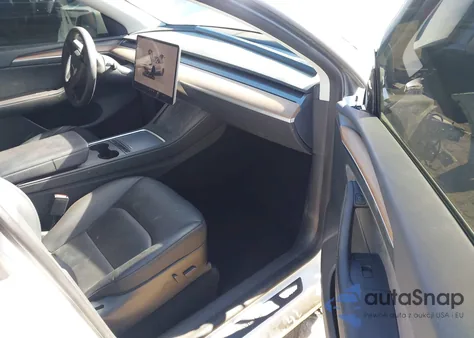 2023 Tesla Model Y Performance Dual Motor All-Wheel Drive z USA, uszkodzony, nr VIN 7SAYGDEF8PF624047